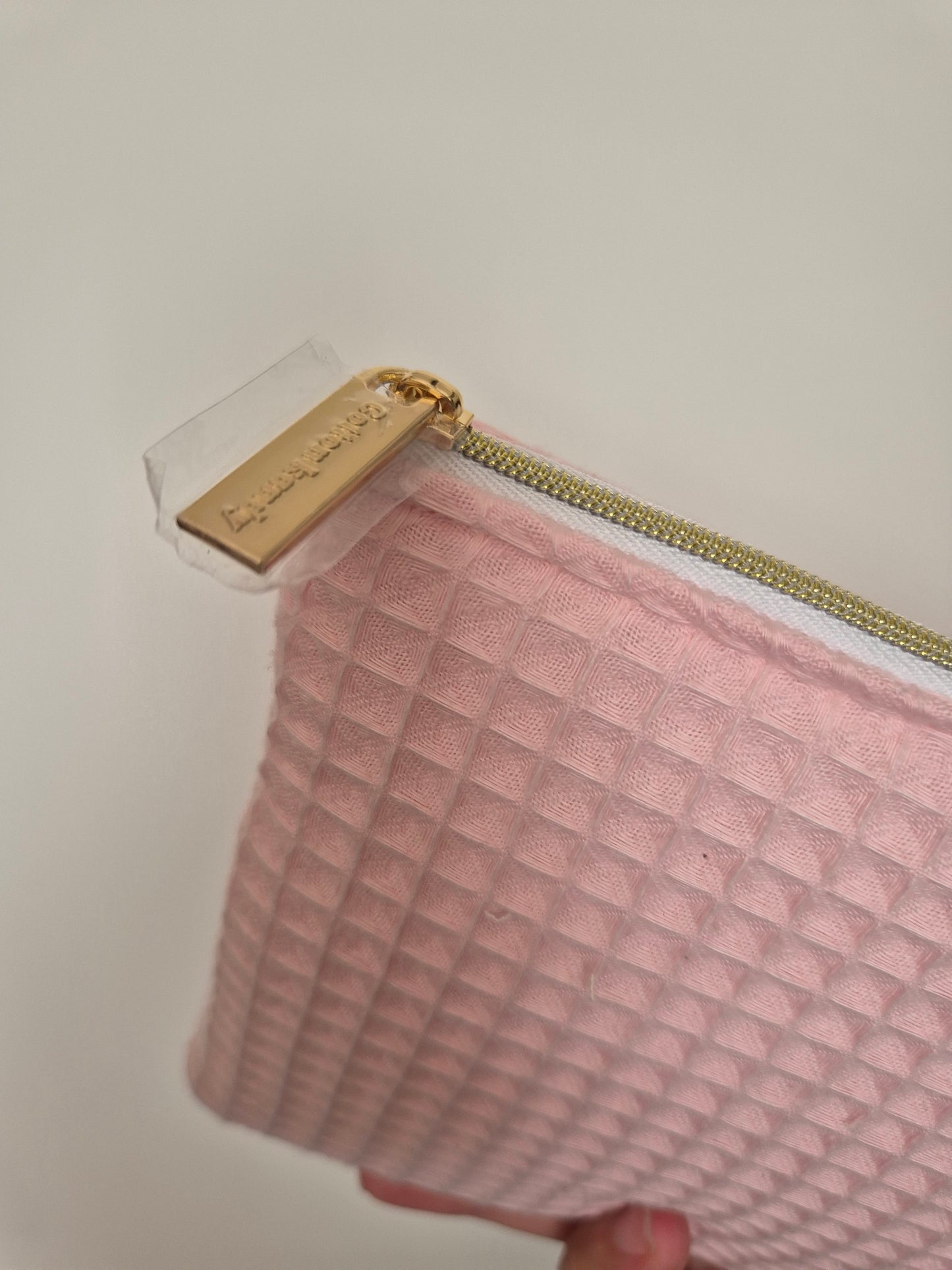 Pink waffle zipper pocket